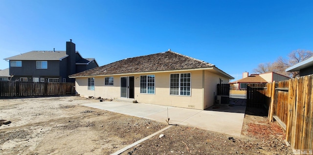 rear view of property featuring a patio