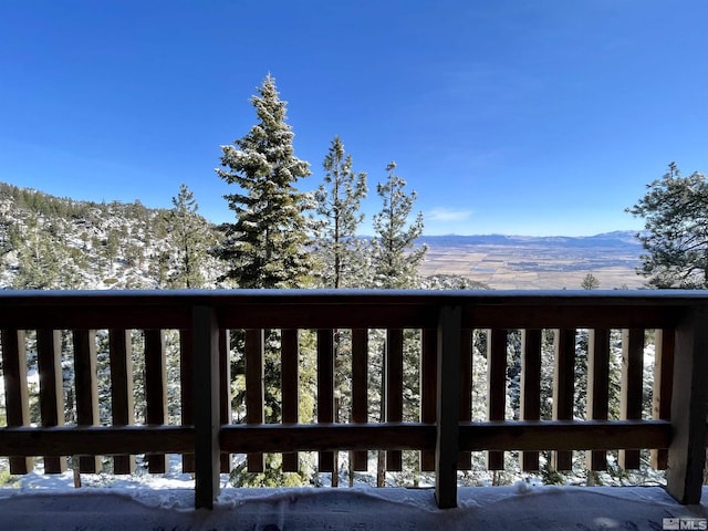 view of snow covered deck