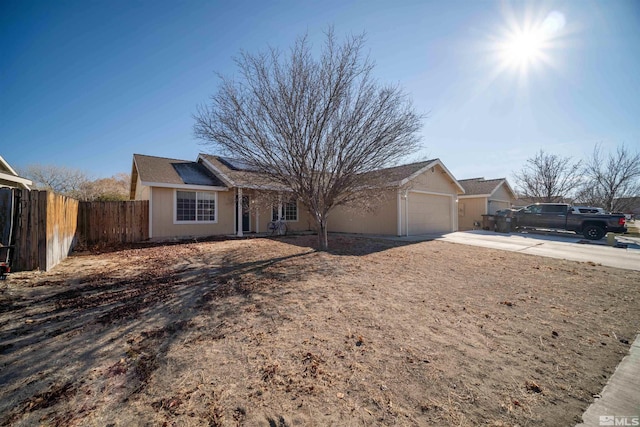 ranch-style home with a garage