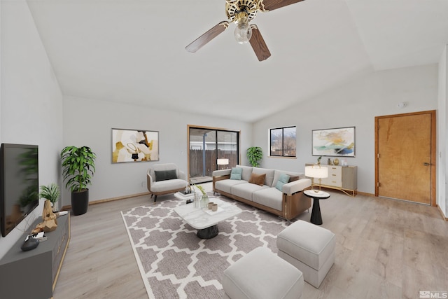 living room featuring vaulted ceiling, ceiling fan, and light wood-type flooring