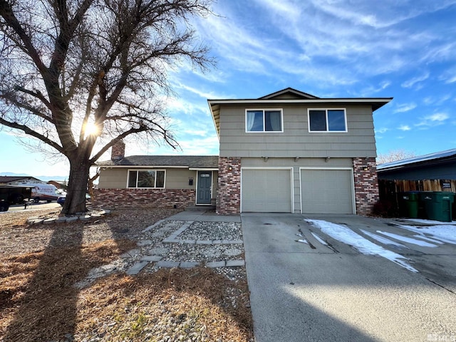 front of property with a garage