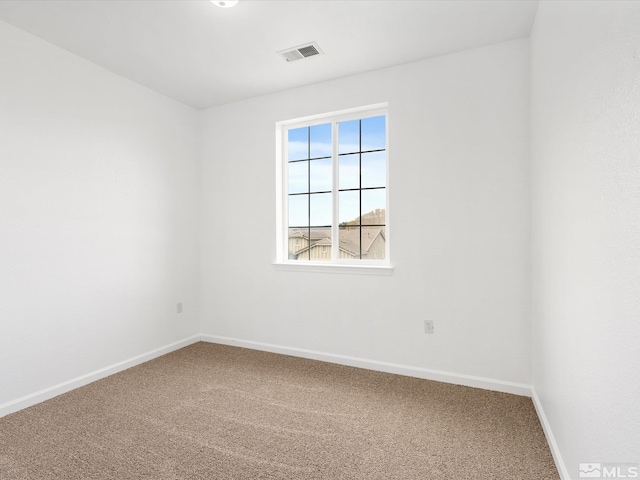 view of carpeted spare room