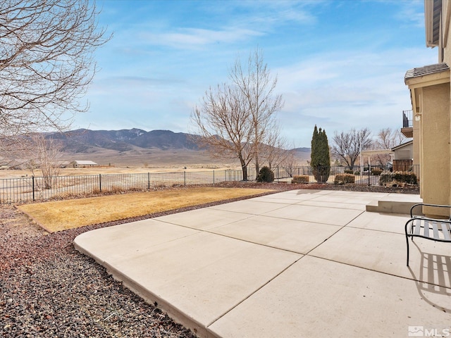 view of patio featuring a mountain view