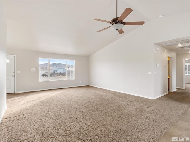 unfurnished living room with light carpet, lofted ceiling, and ceiling fan