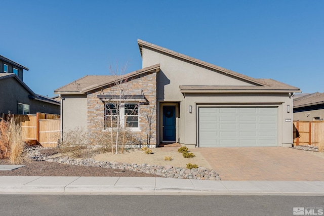 view of front of property featuring a garage