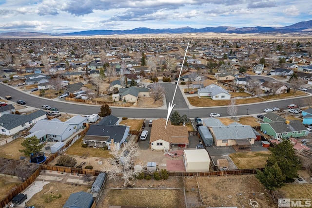 drone / aerial view featuring a mountain view