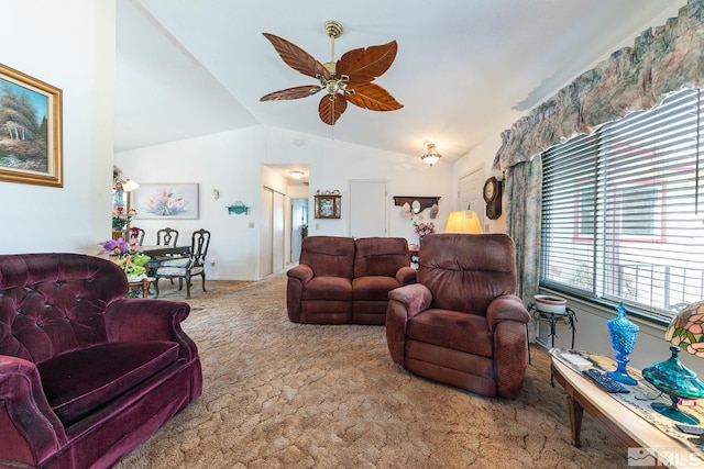 carpeted living room featuring lofted ceiling and ceiling fan