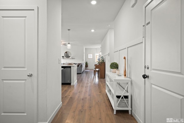 hall with dark wood-type flooring