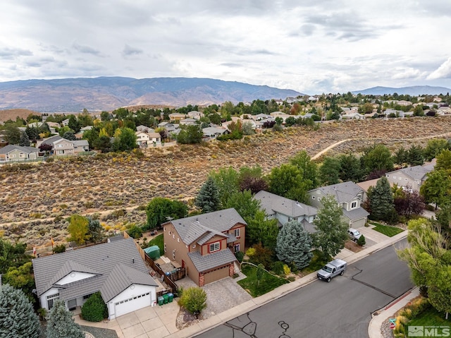 bird's eye view with a mountain view