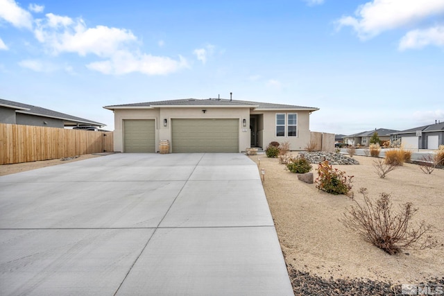 ranch-style house featuring a garage