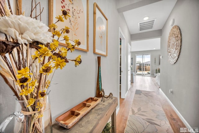 hall featuring light hardwood / wood-style flooring