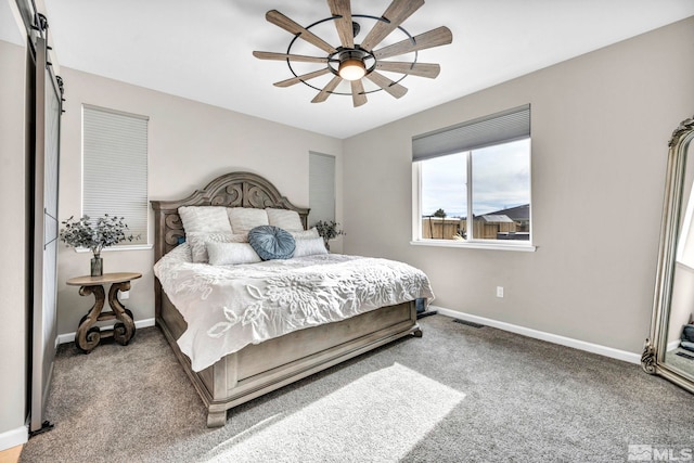 bedroom with light colored carpet and ceiling fan