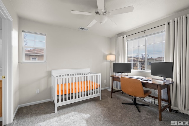 carpeted bedroom with ceiling fan