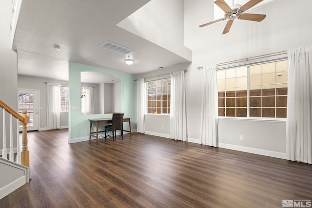 interior space with dark hardwood / wood-style floors and ceiling fan