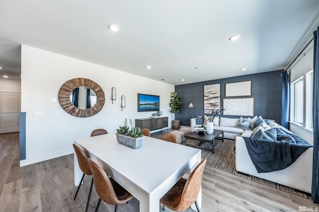 dining area with light hardwood / wood-style flooring