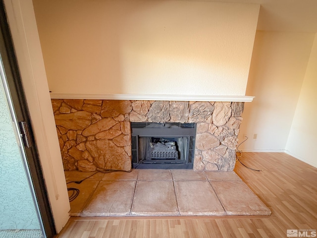 interior details featuring hardwood / wood-style floors