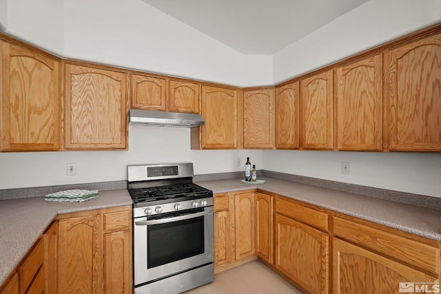 kitchen with stainless steel gas range