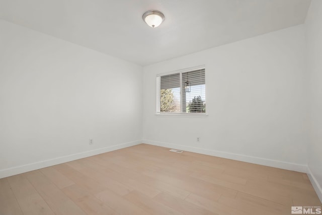 empty room featuring light wood-type flooring