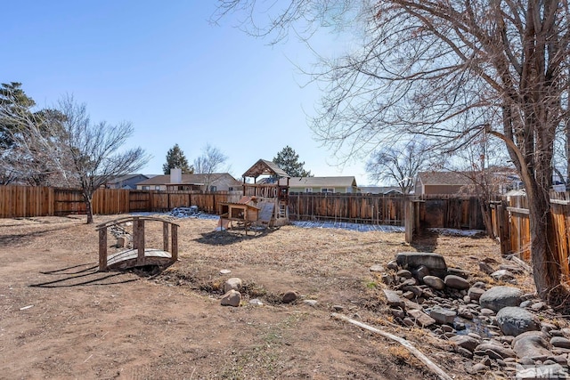 view of yard with a playground