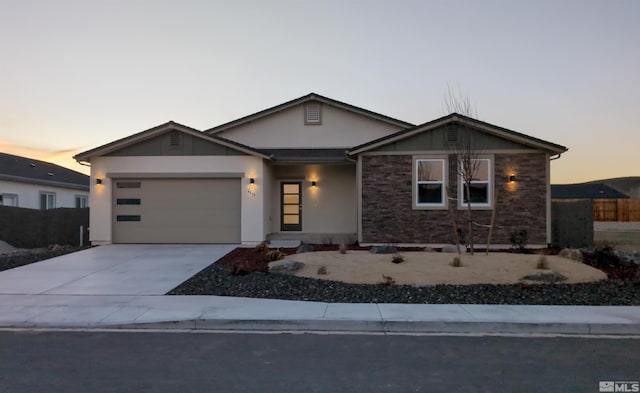 view of front of property with a garage