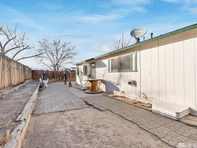 view of home's exterior featuring a patio