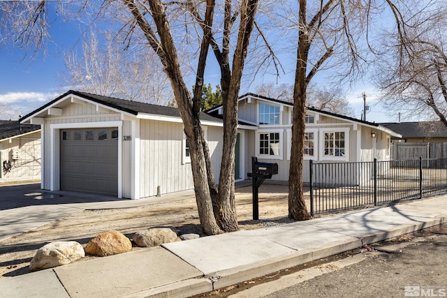 ranch-style home featuring a garage