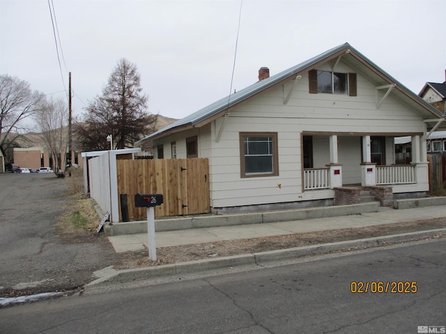 bungalow-style house featuring covered porch