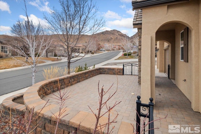 view of patio with a mountain view