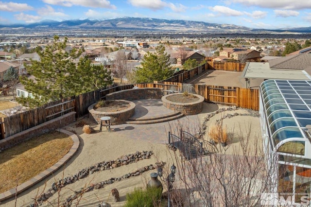 drone / aerial view featuring a mountain view