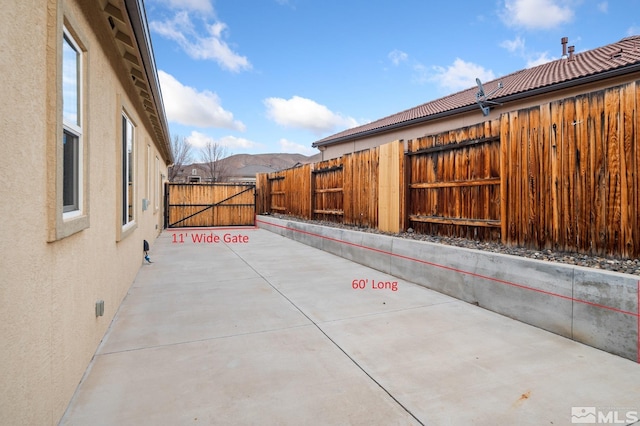 view of patio with a mountain view