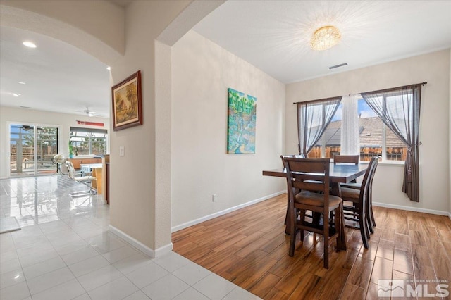 dining space featuring light hardwood / wood-style flooring