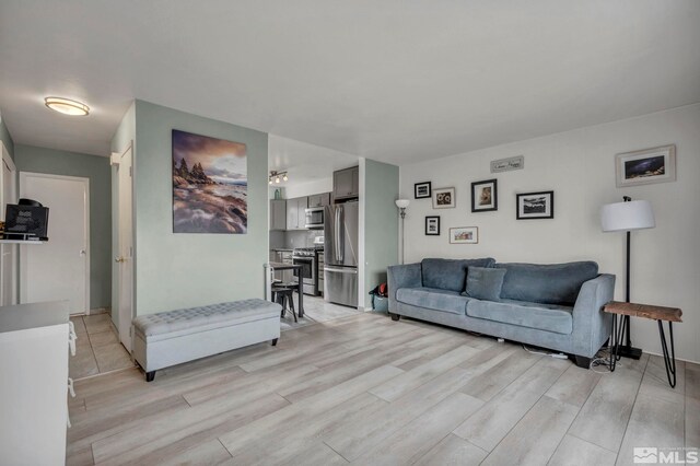 living room featuring light wood-type flooring