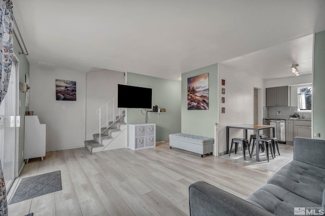 living room featuring light wood-type flooring