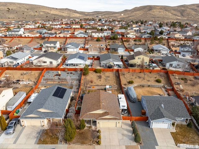 drone / aerial view featuring a mountain view