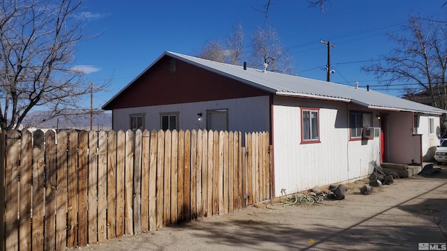 view of home's exterior with cooling unit