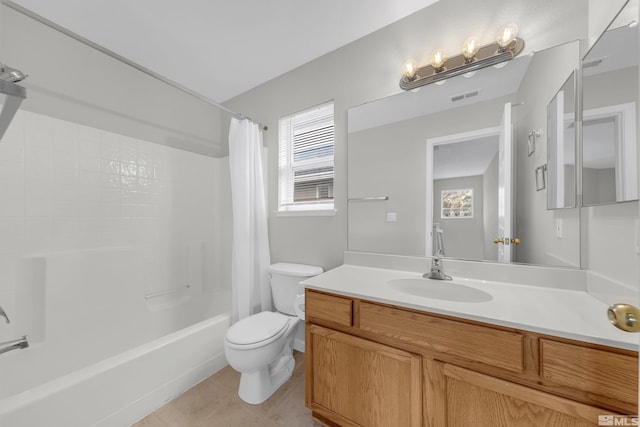 full bathroom with tile patterned flooring, vanity, toilet, and shower / bathtub combination with curtain