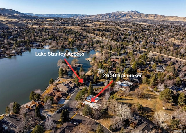 aerial view with a water and mountain view