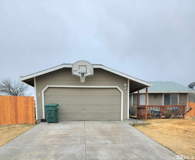 single story home with a porch and a garage