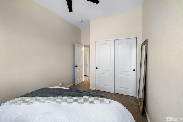 bedroom featuring a closet, ceiling fan, and dark colored carpet