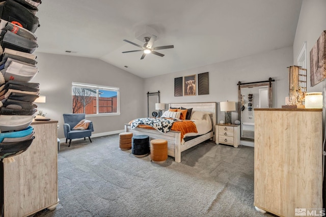 carpeted bedroom featuring lofted ceiling and ceiling fan