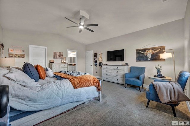 carpeted bedroom featuring ceiling fan, lofted ceiling, and connected bathroom