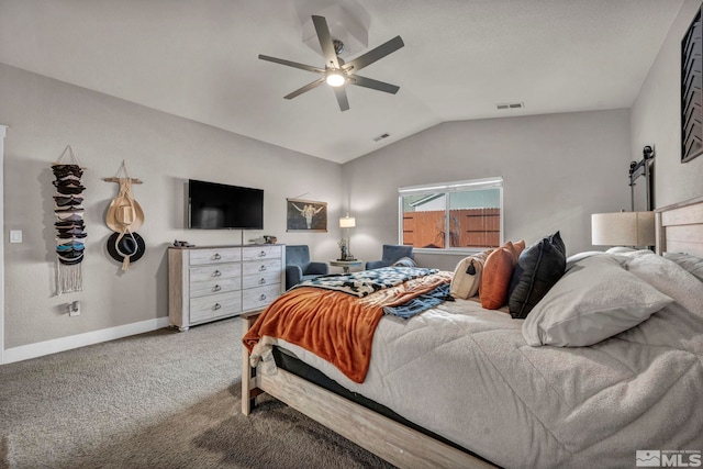 bedroom with vaulted ceiling, carpet floors, and ceiling fan