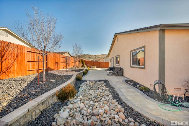 view of yard with a patio area