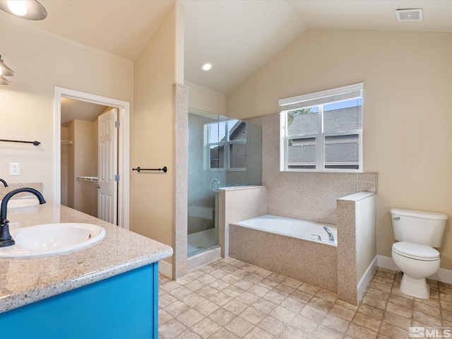 full bathroom featuring independent shower and bath, vanity, lofted ceiling, and toilet