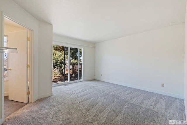 view of carpeted spare room