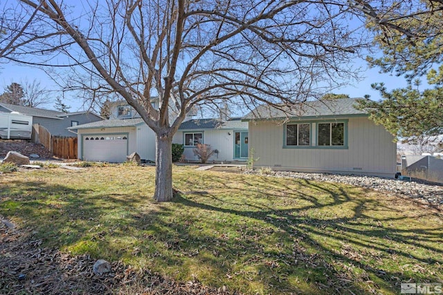 single story home featuring a garage and a front yard