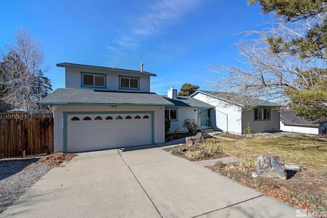 front of property with a garage and a front lawn