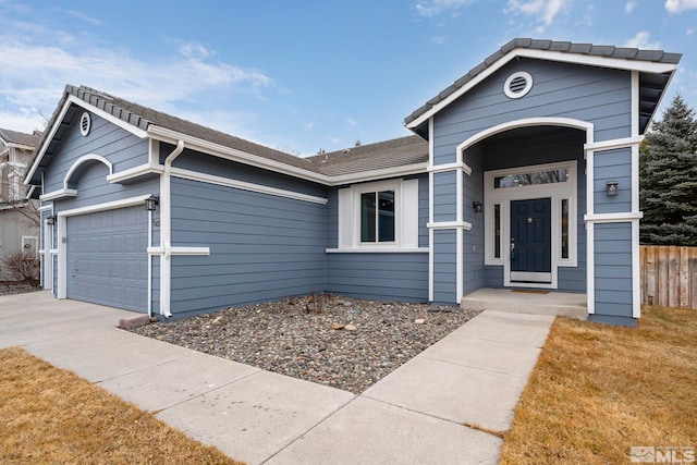 single story home with a garage