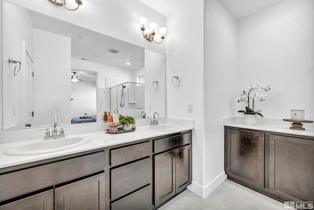 full bath featuring double vanity, ensuite bath, a sink, and visible vents