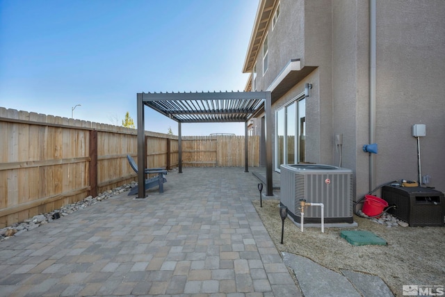 view of patio / terrace with a pergola, a fenced backyard, and central AC unit